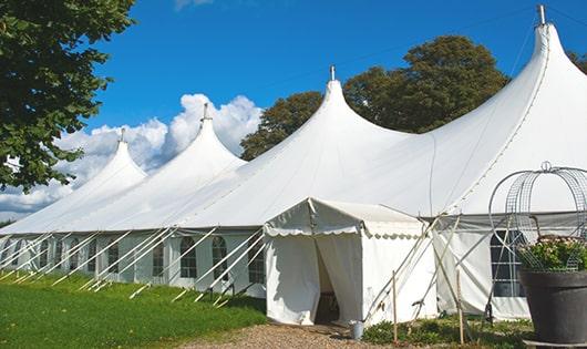 a group of luxury portable restrooms with individual stalls and running water in Wilton, CA